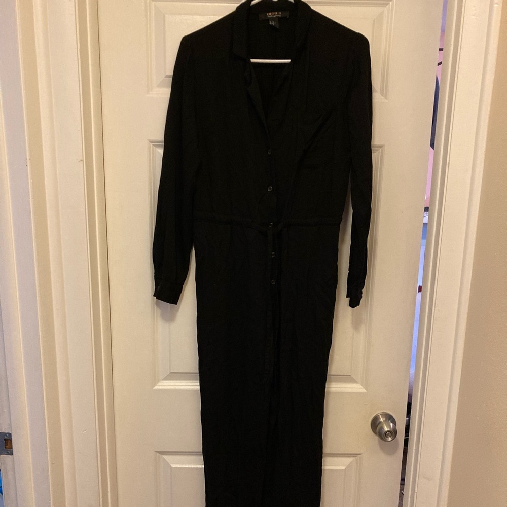 Black jumpsuit/romper cloth material